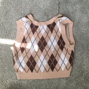Cropped sweater shirt good for layering and can be made dressy or casual
